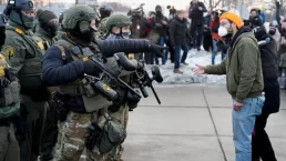 U.S. Border Patrol agents confront a demonstrator during a protest against immigration enforcement in Minneapolis on Jan. 8, 2026. (Reuters)