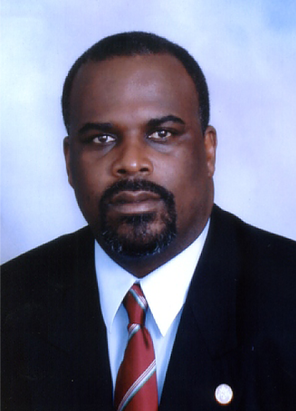 Dr. Michael Eugene Misick