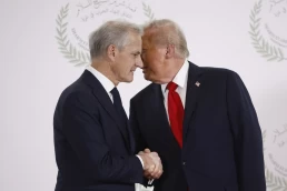 President Donald Trump and Norway’s Prime Minister Jonas Gahr Store shake hands during the group photo at the Gaza International Peace Summit in Sharm el-Sheikh, Egypt, Oct.13 2025. (Yoan Valat, Pool photo via AP, File)